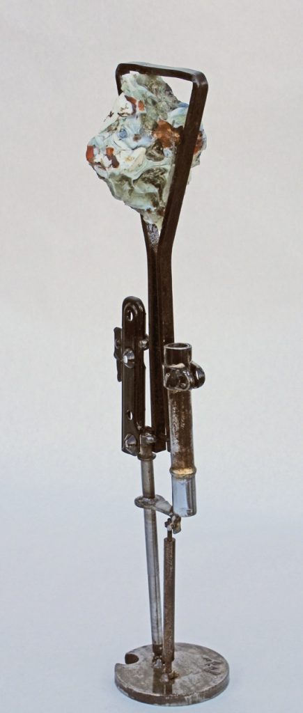 metal sculpture with glass