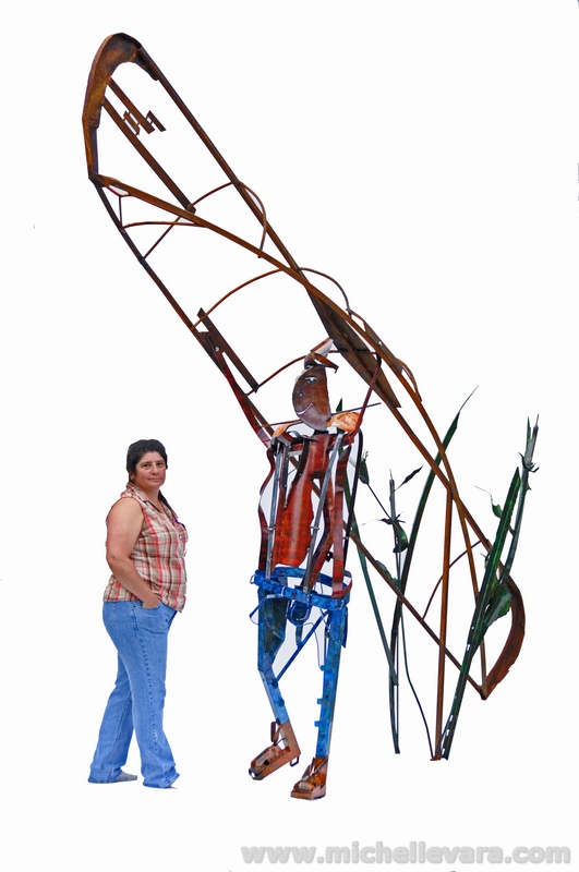 Artist miChelle Vara and finished sculpture