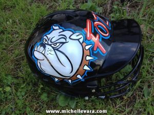 Softball, Baseball Helmets, with school logos and names painted.