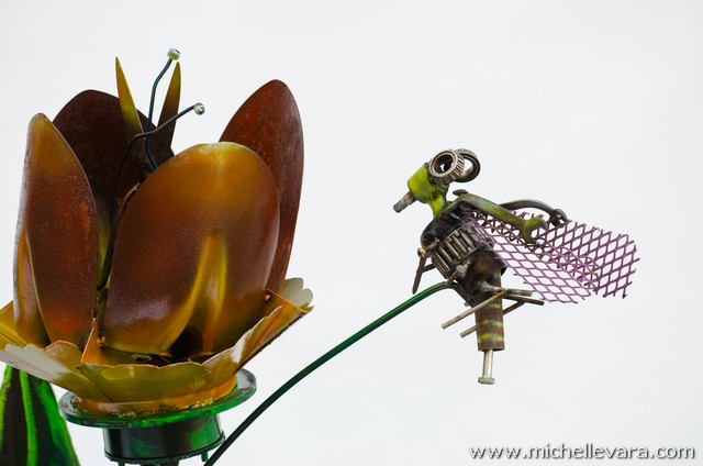 Large Tulips and bee's made from recycled welded material.