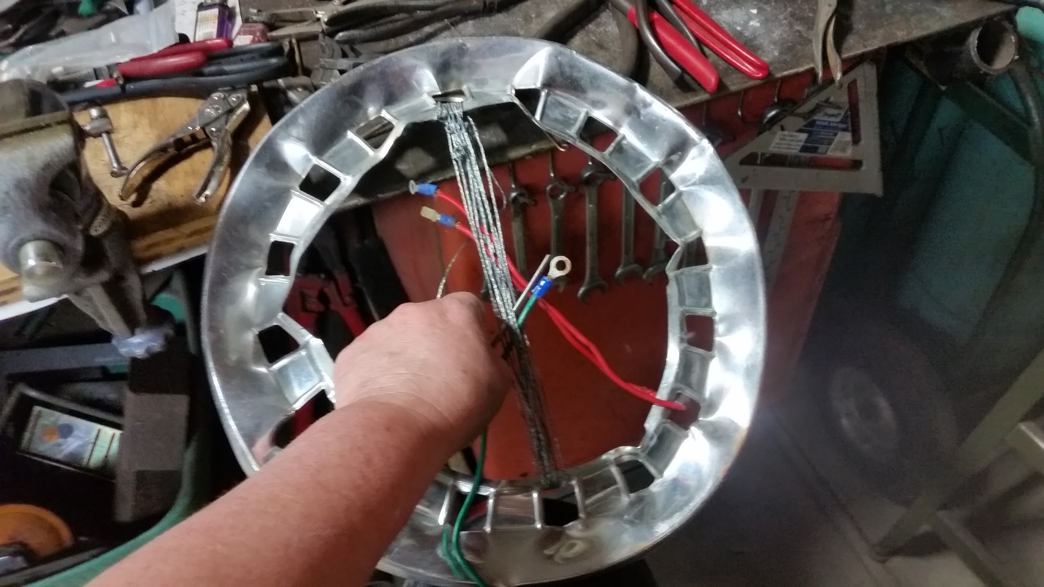 Weaving Wire on hubcap loom