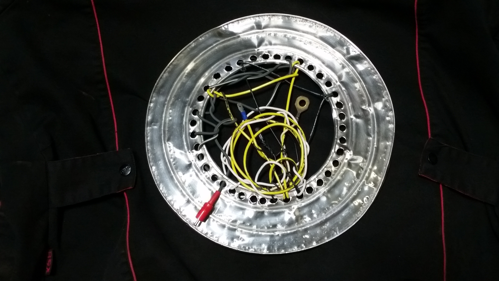 Weaving Wire on hubcap loom