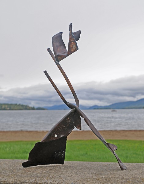 metal sculpture depicting Joy