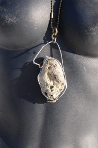 622J. Magdal side 1-“Tower” or “Castle” within is an English sea rock silver brass and steel sculpture that can be worn.
