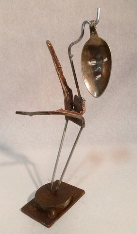 Spoon Art, metals welded with enamel paint accents. Sculpture that wears like Jewelry.