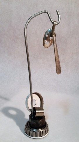 kachina, metals welded with enamel paint accents. Sculpture that wears like Jewelry.