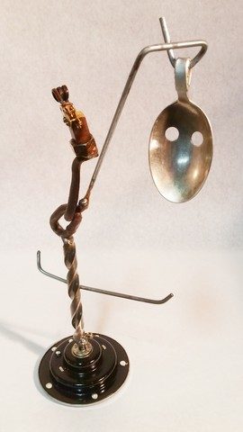 Kachina, metals welded with enamel paint accents. Sculpture that wears like Jewelry.