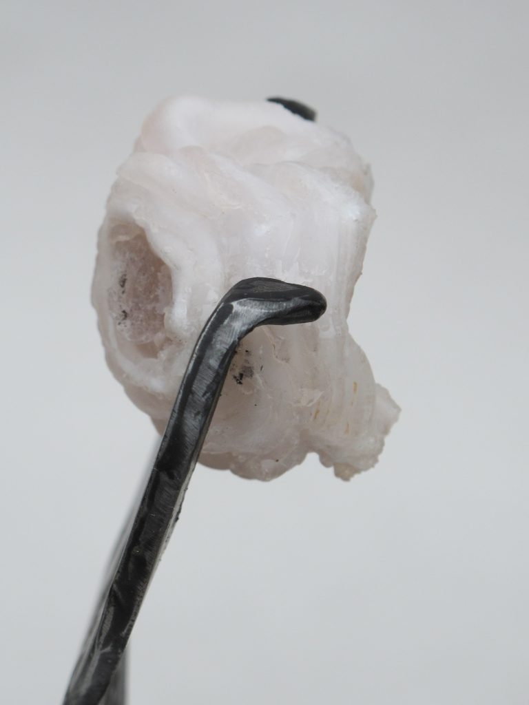 Sculpture made from Steel, Geocite stone, finished in graphite and crushed glass.