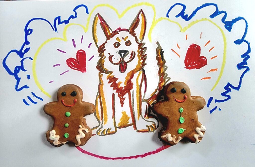 Oil drawing German Shepard on art paper with a baked Gingerbread couple.